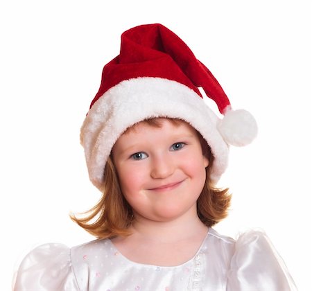 picture of santa with cute babies - Portrait of pretty christmas girl in white dress and santa hat, smiling isolated on white background Stock Photo - Budget Royalty-Free & Subscription, Code: 400-05288527