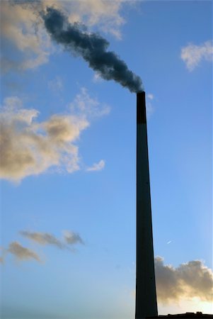 simsearch:400-07171274,k - Smoke stack on a blue sky background from Esbjerg town in Denmark. Stock Photo - Budget Royalty-Free & Subscription, Code: 400-05280761
