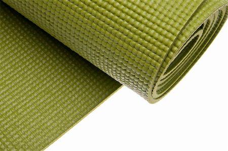 Green Yoga  Exercise Mat, Partially Rolled. Stock Photo - Budget Royalty-Free & Subscription, Code: 400-05281262