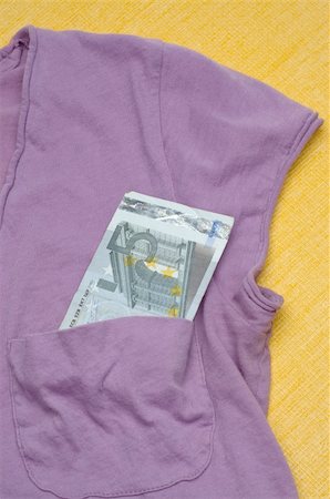 simsearch:400-04263617,k - Euro Currency in a Shirt Pocket Money Concept. Photographie de stock - Aubaine LD & Abonnement, Code: 400-05281546