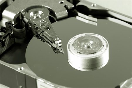 simsearch:400-05252692,k - Macro photo - Hard Disk Drive. Great details ! Stock Photo - Budget Royalty-Free & Subscription, Code: 400-05295798