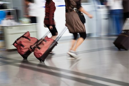 simsearch:695-05773315,k - bags at the airport, motion blur Stock Photo - Budget Royalty-Free & Subscription, Code: 400-05296937