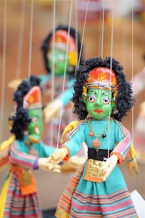 souvenir masks - Jointed puppet manipulated from above by strings or wires attached to its limbs,nice souvenir in Kathmandu,Nepal. Stock Photo - Budget Royalty-Free & Subscription, Code: 400-05297542