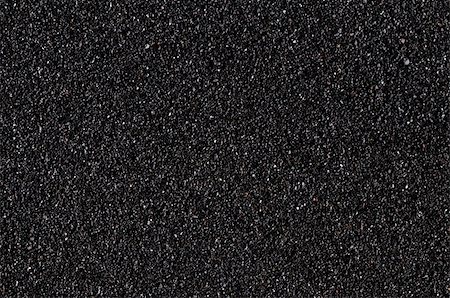 Closeup on the black sand of volcanic origin Stock Photo - Budget Royalty-Free & Subscription, Code: 400-05298761