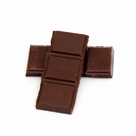 simsearch:400-05136453,k - chocolate pieces islated on a white background Stock Photo - Budget Royalty-Free & Subscription, Code: 400-05299260