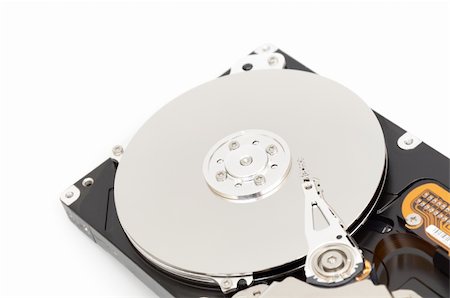 simsearch:400-05238336,k - Opened computer harddisk on a white background Stock Photo - Budget Royalty-Free & Subscription, Code: 400-05299262