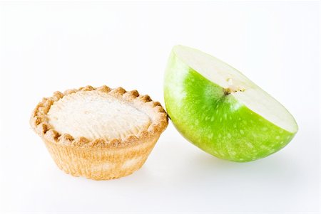 simsearch:400-04370315,k - Freshly made apple pie and half of apple over white background Stock Photo - Budget Royalty-Free & Subscription, Code: 400-05291248