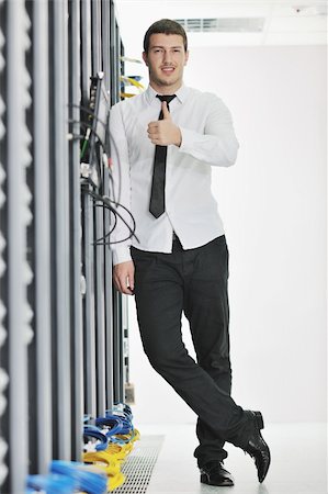 simsearch:400-05291415,k - young handsome business man  engeneer in datacenter server room Stock Photo - Budget Royalty-Free & Subscription, Code: 400-05291404