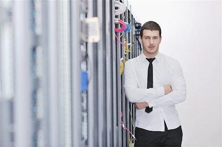 simsearch:400-04239432,k - young handsome business man  engeneer in datacenter server room Stock Photo - Budget Royalty-Free & Subscription, Code: 400-05291405