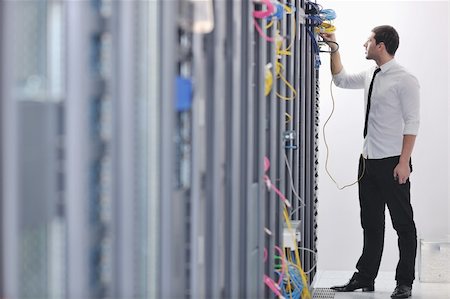 simsearch:400-05291415,k - young handsome business man  engeneer in datacenter server room Stock Photo - Budget Royalty-Free & Subscription, Code: 400-05291407