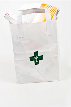 pharmacy purchase - Pharmacy bag full of pills Stock Photo - Budget Royalty-Free & Subscription, Code: 400-05304729