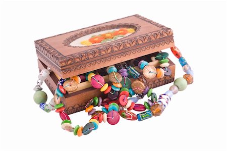 wooden box with fashion beads on white background Foto de stock - Super Valor sin royalties y Suscripción, Código: 400-05305055