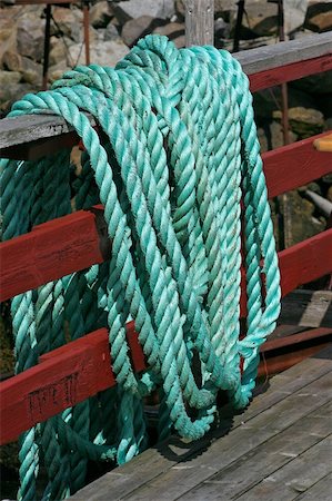 simsearch:400-05254289,k - Green ship rope hanging on a fence Stock Photo - Budget Royalty-Free & Subscription, Code: 400-05305644