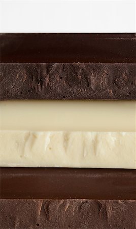 simsearch:400-05136453,k - Stack of Black, Brown and White Chocolate isolated on white background Stock Photo - Budget Royalty-Free & Subscription, Code: 400-05306265