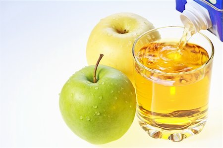 simsearch:400-07096505,k - Green and yellow apples and glass filling with apple juice Stock Photo - Budget Royalty-Free & Subscription, Code: 400-05306446