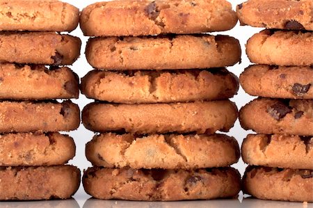 fat distress - close up of three piles of chocolate chip cookies. High calories but very nice and tastefull freshly baked just out of the oven. Stock Photo - Budget Royalty-Free & Subscription, Code: 400-05306750