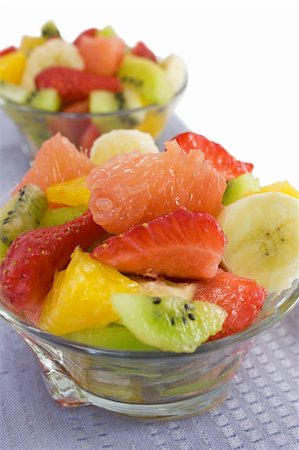 simsearch:400-05891431,k - Fruit salad on a white background close-up Stock Photo - Budget Royalty-Free & Subscription, Code: 400-05307282