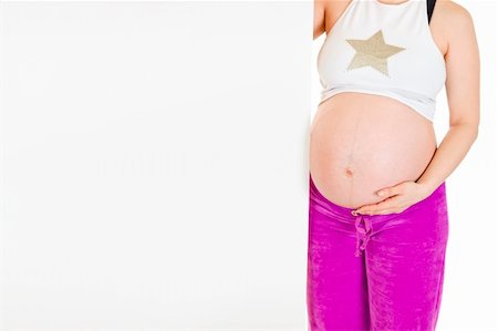 simsearch:400-05716366,k - Pregnant woman holding blank billboard  isolated on white. Close-up. Stock Photo - Budget Royalty-Free & Subscription, Code: 400-05307620