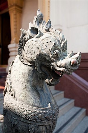 Stucco lion head pattern in the top of the stairs in the temple. Stock Photo - Budget Royalty-Free & Subscription, Code: 400-05308013