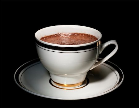 simsearch:700-03698239,k - A white cup of how chocolate drink, on black background Stock Photo - Budget Royalty-Free & Subscription, Code: 400-05308915