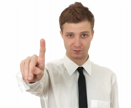 Young man pointing finger isolated on white Stock Photo - Budget Royalty-Free & Subscription, Code: 400-05309433