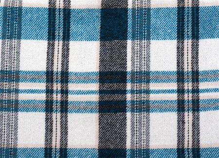 Knitted colour plaid fabrics in the manner of background Stock Photo - Budget Royalty-Free & Subscription, Code: 400-05301615