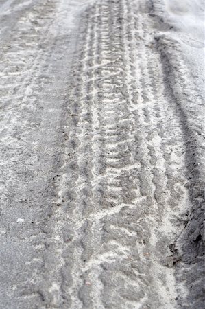 skid marks - Traces of car tyres on the wet fields road Stock Photo - Budget Royalty-Free & Subscription, Code: 400-05302273