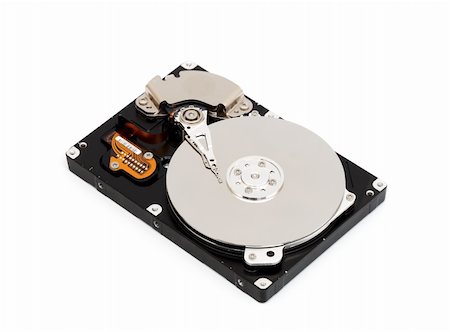 simsearch:400-05252692,k - Opened computer harddisk isolated on white background Stock Photo - Budget Royalty-Free & Subscription, Code: 400-05303169