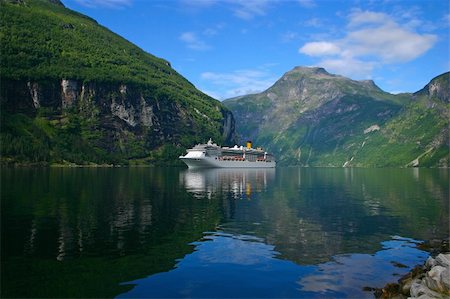 The Geiranger fjord is one of Norway's most visited tourist sites and has been listed as a UNESCO World Heritage Site. Stock Photo - Budget Royalty-Free & Subscription, Code: 400-05314678