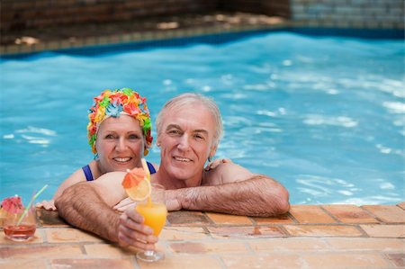 Happy mature couple in the swimming pool Stock Photo - Budget Royalty-Free & Subscription, Code: 400-05314742