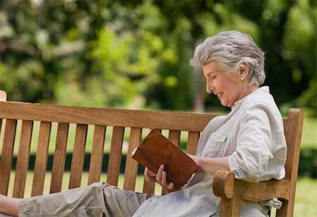 shoulder old lady white - Retired woman reading a book on the  bench Stock Photo - Budget Royalty-Free & Subscription, Code: 400-05315036