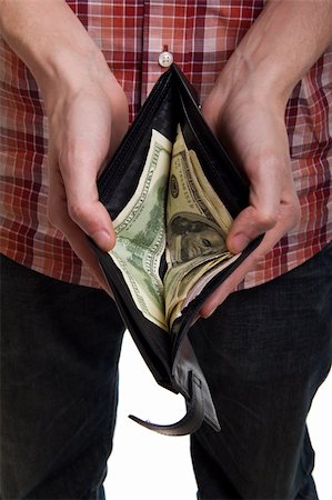 man shows purse with dollars close up Stock Photo - Budget Royalty-Free & Subscription, Code: 400-05316327