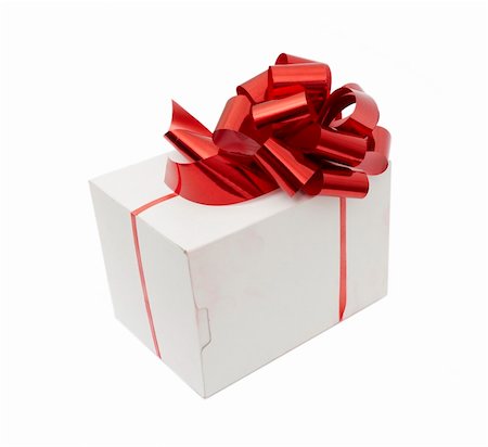 simsearch:400-08806797,k - Gift and red bow isolated on a white background Photographie de stock - Aubaine LD & Abonnement, Code: 400-05316362