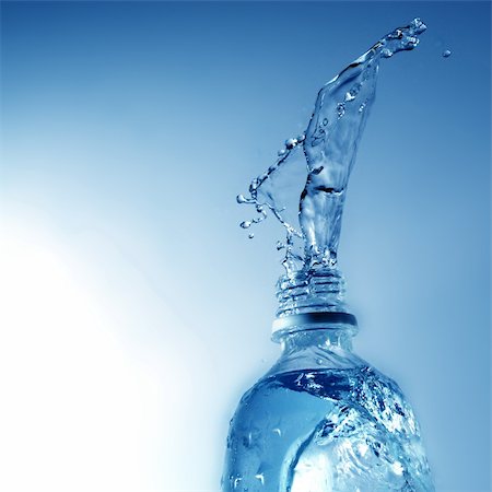 polymer - drinking water pouring from pvc bottle on blue Stock Photo - Budget Royalty-Free & Subscription, Code: 400-05316989