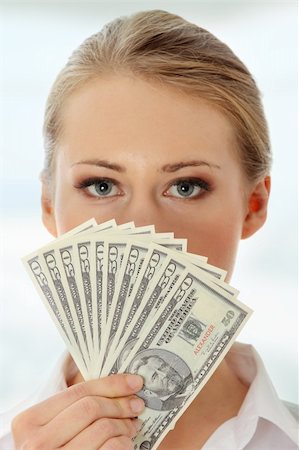 simsearch:400-05715208,k - Businesswoman with dollars Stock Photo - Budget Royalty-Free & Subscription, Code: 400-05317570