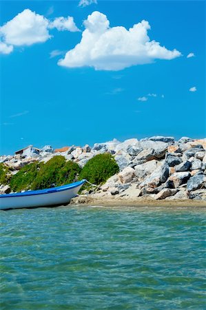 simsearch:400-05896461,k - beach with stones and boats in the sea Stock Photo - Budget Royalty-Free & Subscription, Code: 400-05317821