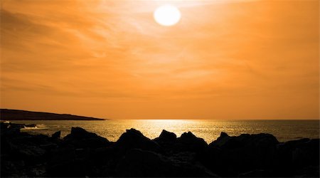 simsearch:400-06641969,k - golden sunset from the cliffs edge on a rocky landscape of the burren in county clare ireland Foto de stock - Super Valor sin royalties y Suscripción, Código: 400-05311072