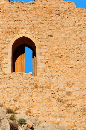 simsearch:400-05338054,k - The Ruins of a Medieval Fortress on the Greek Island of Rhodes Stock Photo - Budget Royalty-Free & Subscription, Code: 400-05311999