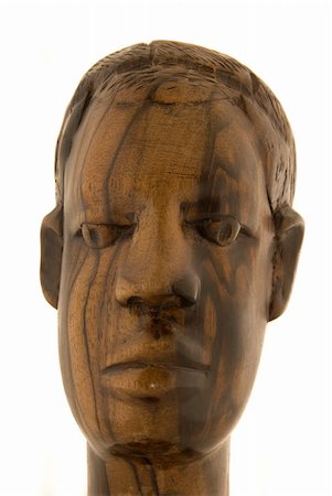 African ebony statuette - full face Photographie de stock - Aubaine LD & Abonnement, Code: 400-05324230