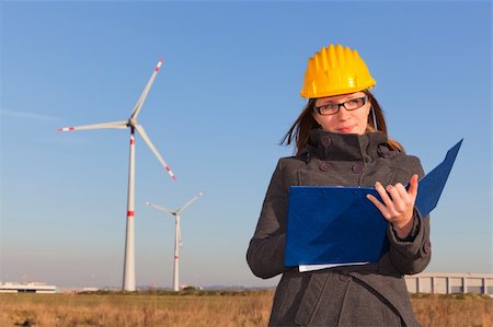 Female Engineer in Wind Turbine Power Generator Station Stock Photo - Budget Royalty-Free & Subscription, Code: 400-05324241