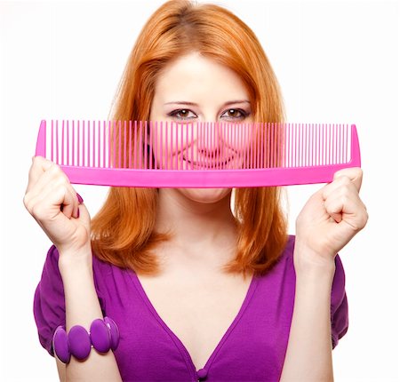 simsearch:400-04658893,k - Funny red-haired girl with big comb. Photographie de stock - Aubaine LD & Abonnement, Code: 400-05324396