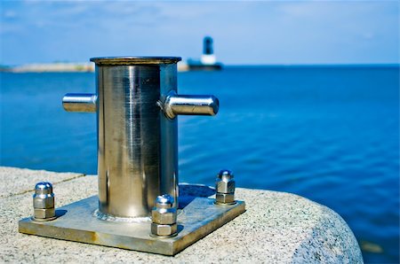simsearch:400-04433053,k - Stainless steel bitts against a background of blue sea Stock Photo - Budget Royalty-Free & Subscription, Code: 400-05326820