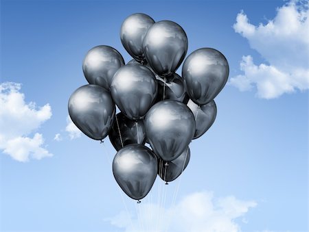 silver air balloons floating on a blue sky Stock Photo - Budget Royalty-Free & Subscription, Code: 400-05328401