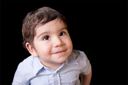 Cute and happy baby, isolated on black, studio shot Stock Photo - Budget Royalty-Free & Subscription, Code: 400-05328449