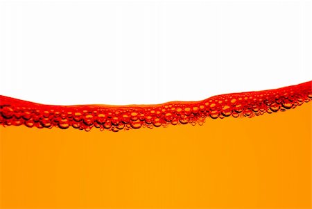 fresh air background - Orange fuel line with bubbles isolated on a white background. Photographie de stock - Aubaine LD & Abonnement, Code: 400-05329634