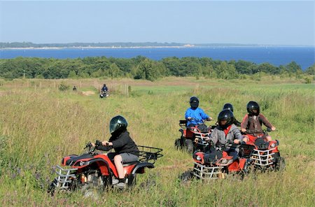 polish preteen - Group of young children riding buggies on the meadow at the coastline Stock Photo - Budget Royalty-Free & Subscription, Code: 400-05321070