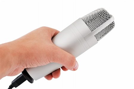 simsearch:400-04278069,k - professional microphone in hand on a white background Stock Photo - Budget Royalty-Free & Subscription, Code: 400-05321518