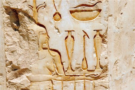encoding - Egyptian  hieroglyphics on limestone wall in egyptian temple Stock Photo - Budget Royalty-Free & Subscription, Code: 400-05322092
