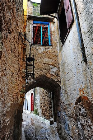 simsearch:400-06530910,k - Narrow Alley With Old Buildings on Greece City of Rhodes Stock Photo - Budget Royalty-Free & Subscription, Code: 400-05334465