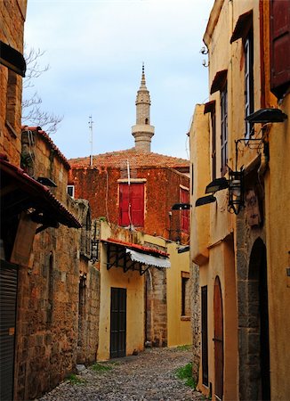 simsearch:400-04375112,k - View to the Minaret from the Old Narrow Street of the Greek City of Rhodes Stock Photo - Budget Royalty-Free & Subscription, Code: 400-05334494